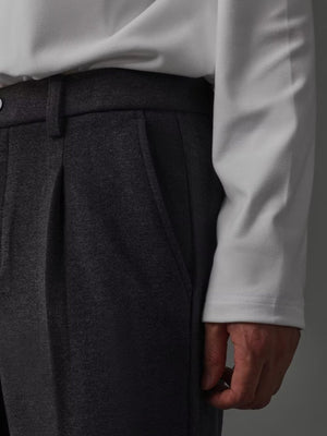 Men's dark gray pocketed sweatpants with a casual fit.