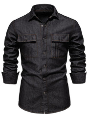 Black denim utility shirt with buttoned chest pockets and a zip pocket detail.