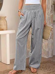 Gingham wide-leg maternity pants in Black Plaid with smocked waistband and pockets.