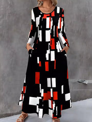 Maxi dress with geometric print, long sleeves, round neck, and pockets.