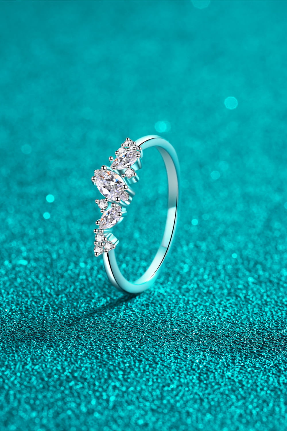 Silver Marquise Cluster Moissanite Ring with marquise and round cut stones.