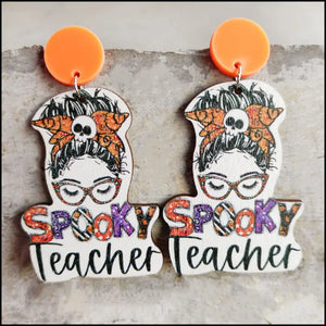 Spooky Teacher statement earrings in Style B with orange acrylic tops.