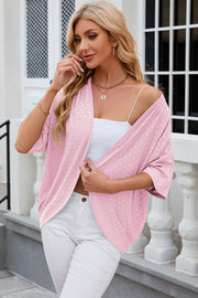 Blush pink open-front crochet kimono top with wide sleeves and a relaxed fit.