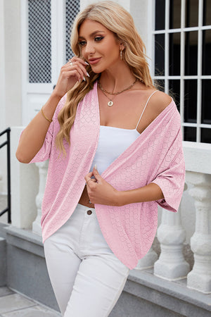 Blush pink open-front crochet kimono top with wide sleeves and a relaxed fit.