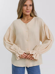 Ochre textured puff sleeve blouse with ruffled cuffs and V-neck