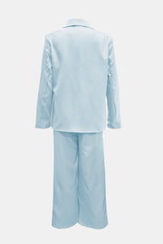 Mint blue track stripe suit with a blazer and wide-leg pants.
