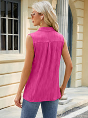 Hot Pink textured collared sleeveless blouse with a button-up back detail.