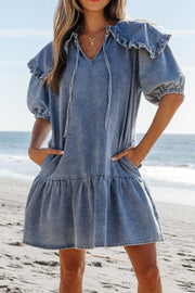 Denim ruffle collar mini dress in medium with puff sleeves and tiered skirt.