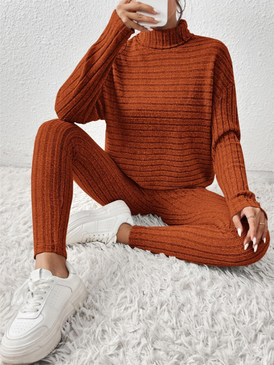 Textured turtleneck lounge set in caramel with ribbed fabric and matching leggings.