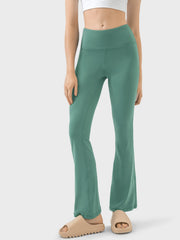 Flared sculpt leggings in turquoise with a high-rise waist and subtle seam details.