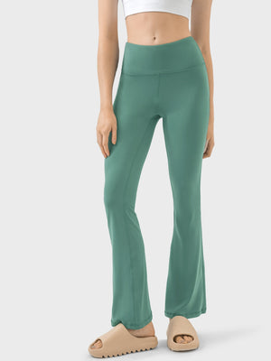 Flared sculpt leggings in turquoise with a high-rise waist and subtle seam details.
