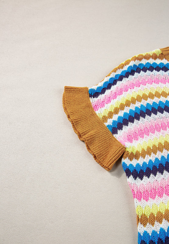 Textured knit sweater with multicolor chevron stripes and contrast trim sleeves.
