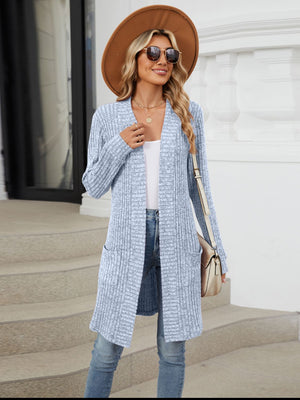 Light blue ribbed knit duster cardigan with pockets and open front.