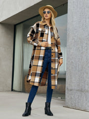 Oversized plaid shirt jacket dress in caramel with button front and pockets.
