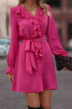 Magenta ruffled button-down A-line dress with tie belt and long sleeves.