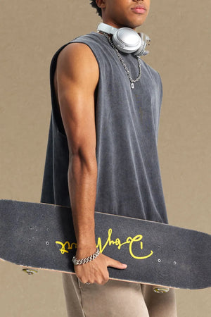 Washed cotton muscle tank in gray with a relaxed fit and crew neck.