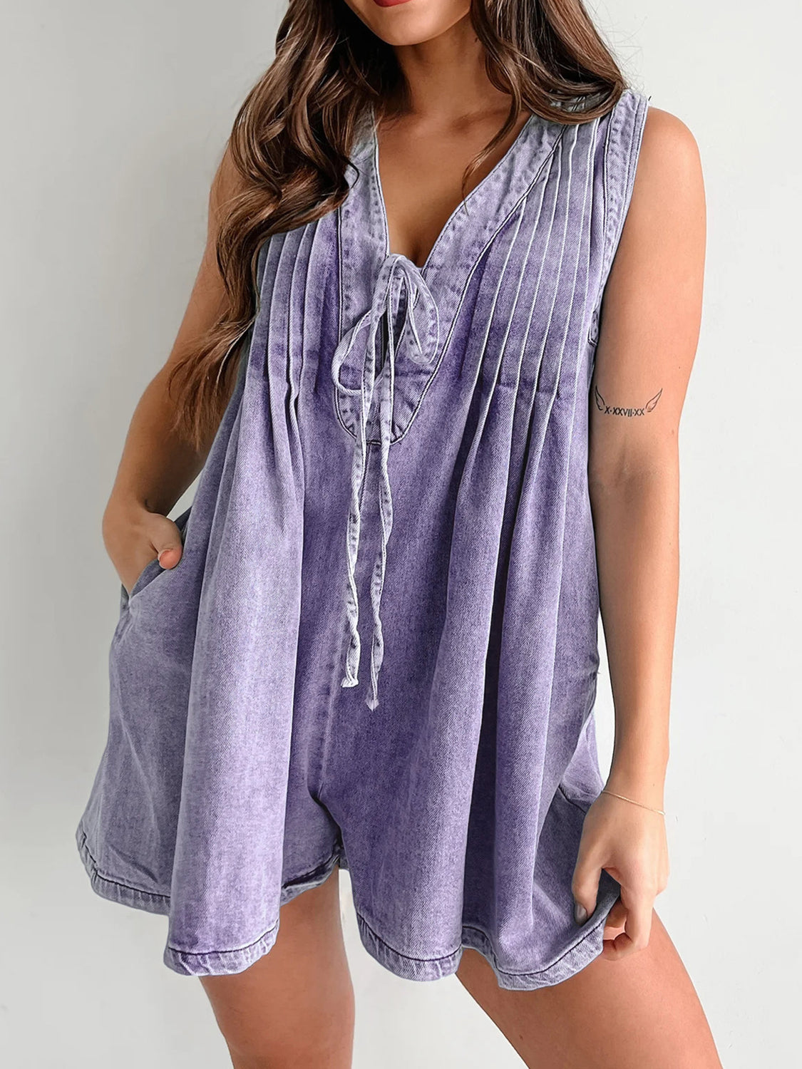 Lavender denim tie-front playsuit with V-neck and pleats