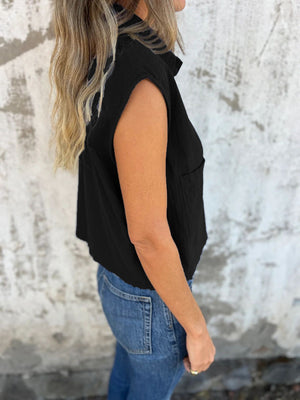 Black button-down cap sleeve shirt with a chest pocket.