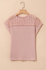 Dusty pink waffle knit top with short sleeves and a lace yoke detail.