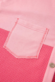 Blush pink waffle knit shacket with a chest pocket and button detail.