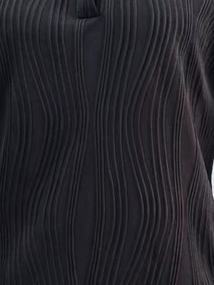 Black collared blouse with wave-effect pleats