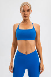 Blue Vonili sports bra with square neckline and crisscross back straps