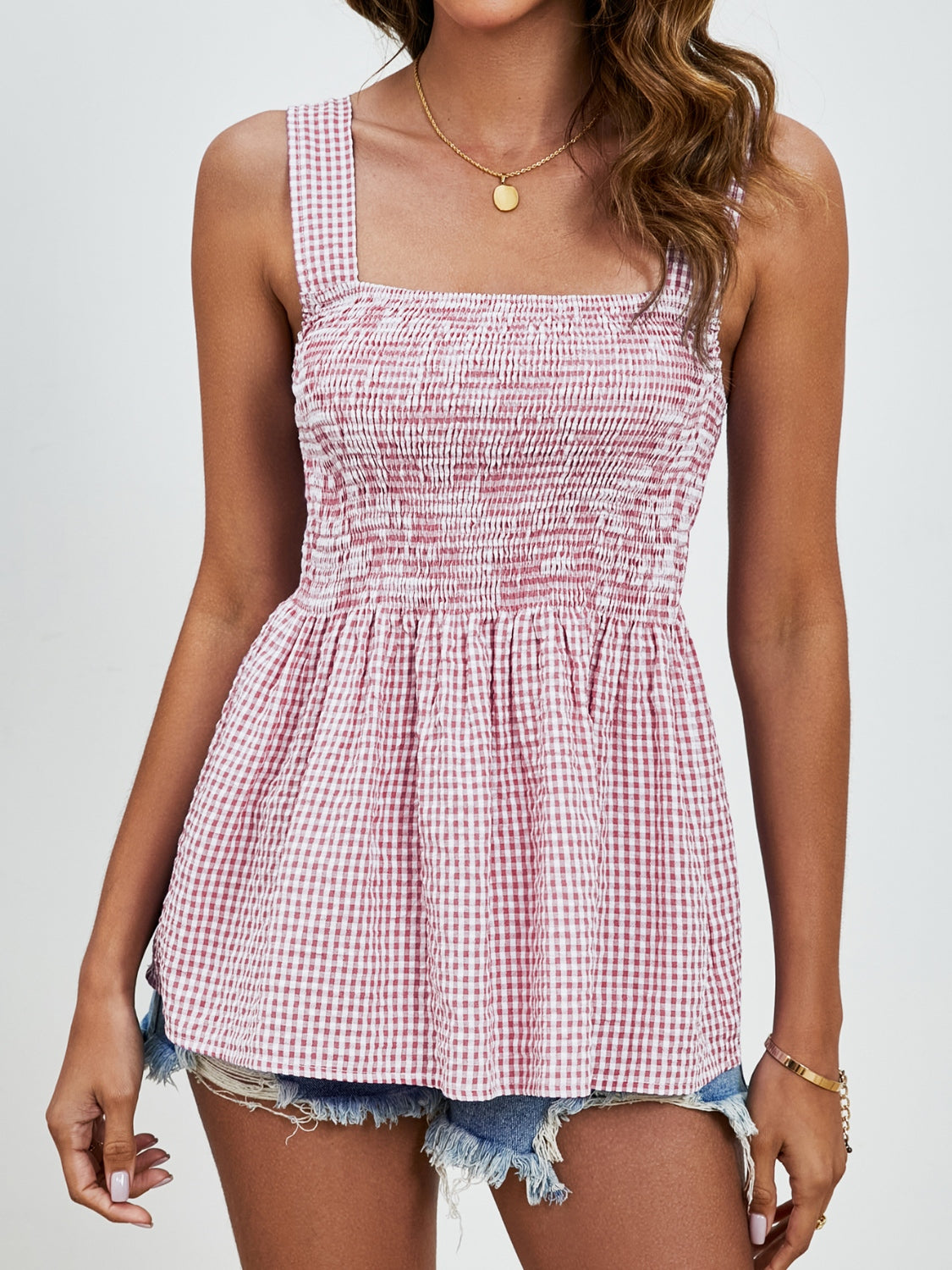 Smocked gingham peplum tank top with square neckline and wide straps in Deep Red.