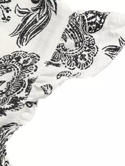 Paisley print maternity maxi dress with ruffled sleeves in black and white.