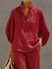 Burgundy button-down loungewear set with a mandarin collar and wide sleeves.