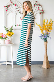 Green and white striped jersey maxi dress with short sleeves and side slits.