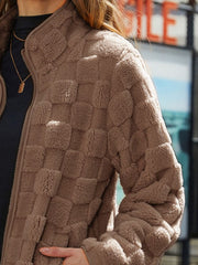 Textured grid zip-up jacket in brown plush fleece with a stand-up collar.