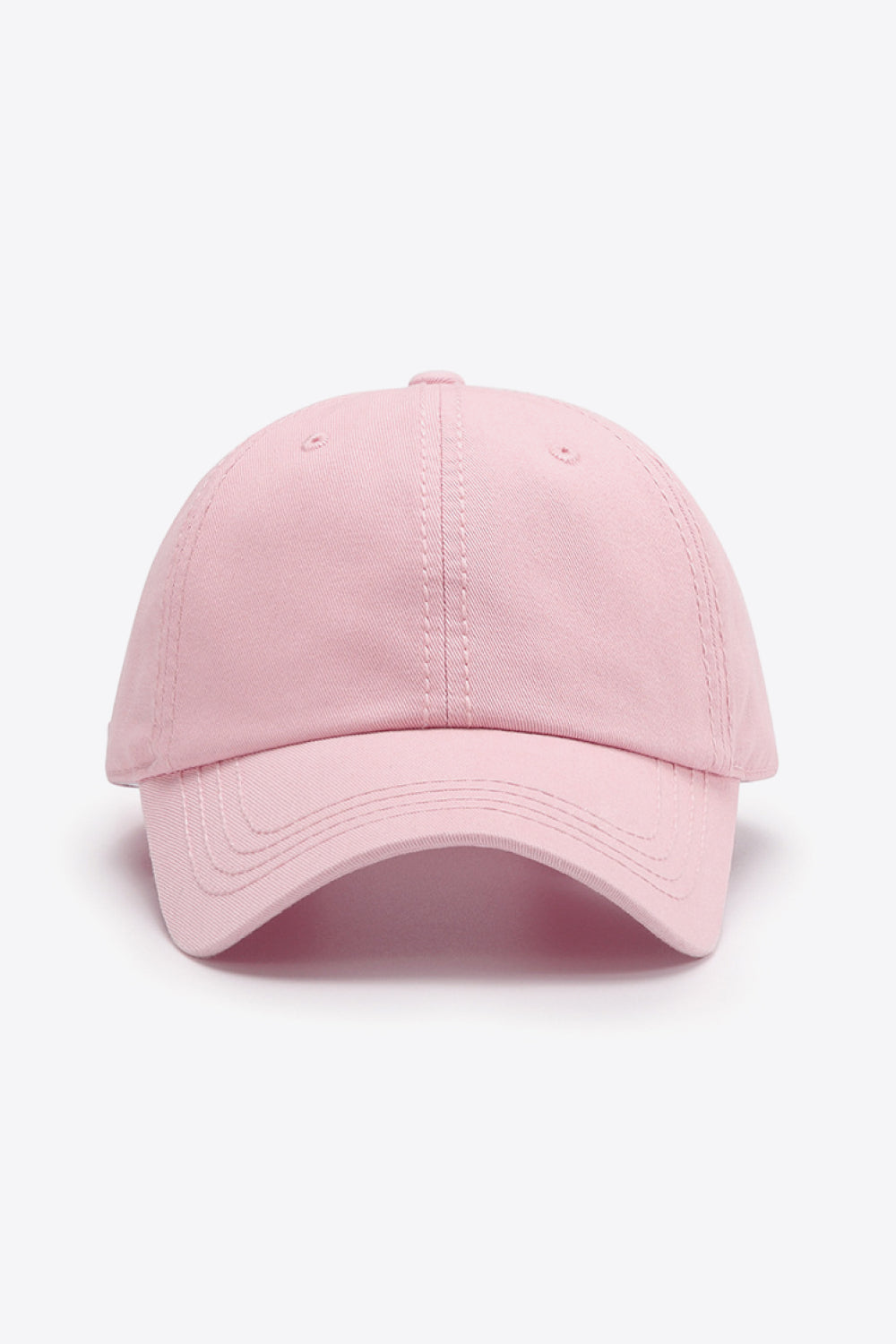 Pink canvas baseball cap with stitched details and curved brim.