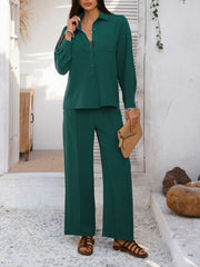 Dark green textured resort shirt and wide leg pants set with button front and collared neckline.