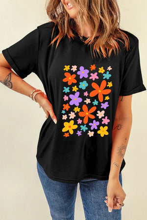 Black round neck tee with colorful bloom print and cuffed short sleeves.
