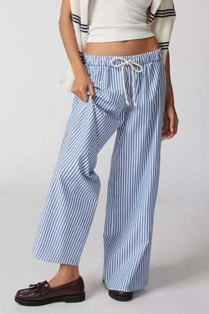 Light blue and white striped wide-leg drawstring trousers with a relaxed fit.