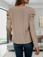 Textured puff sleeve knit top in mocha with a wavy pattern and crew neck.