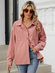 Pink corduroy overshirt with two patch pockets and button front.