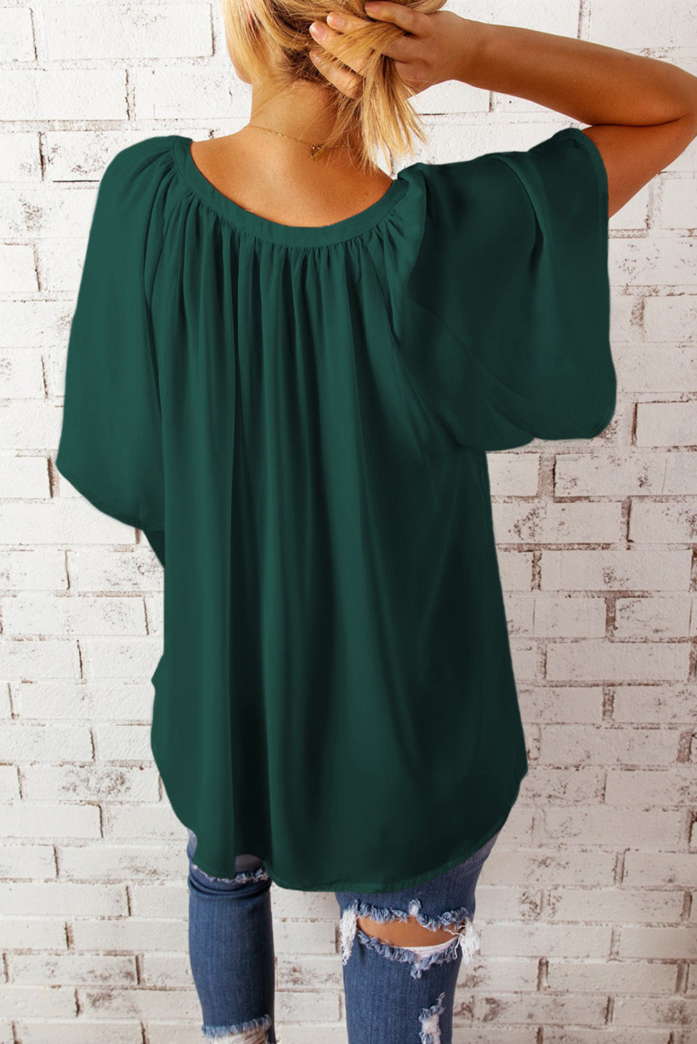 Green relaxed V-neck blouse with cap sleeves and gathered neckline detail