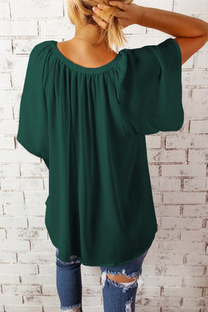 Green relaxed V-neck blouse with cap sleeves and gathered neckline detail