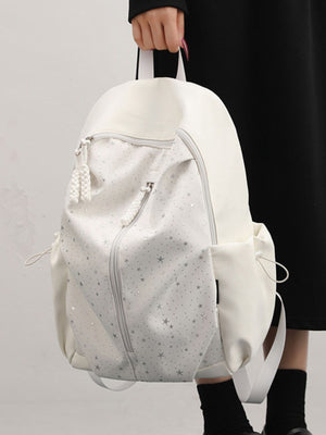 Gray/white nylon school backpack with all-over star pattern and braided zipper pulls.