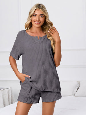 Dark Gray textured ribbed knit pajama set with short sleeves and notched neckline, featuring shorts with pockets.