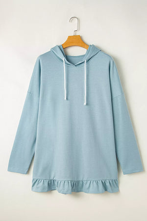 Solid Ruffled Hem Loose Fit Tunic Hoodie in Light Blue, model styling view