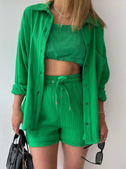 Green textured gauze shirt and shorts set with button-up shirt and drawstring shorts.
