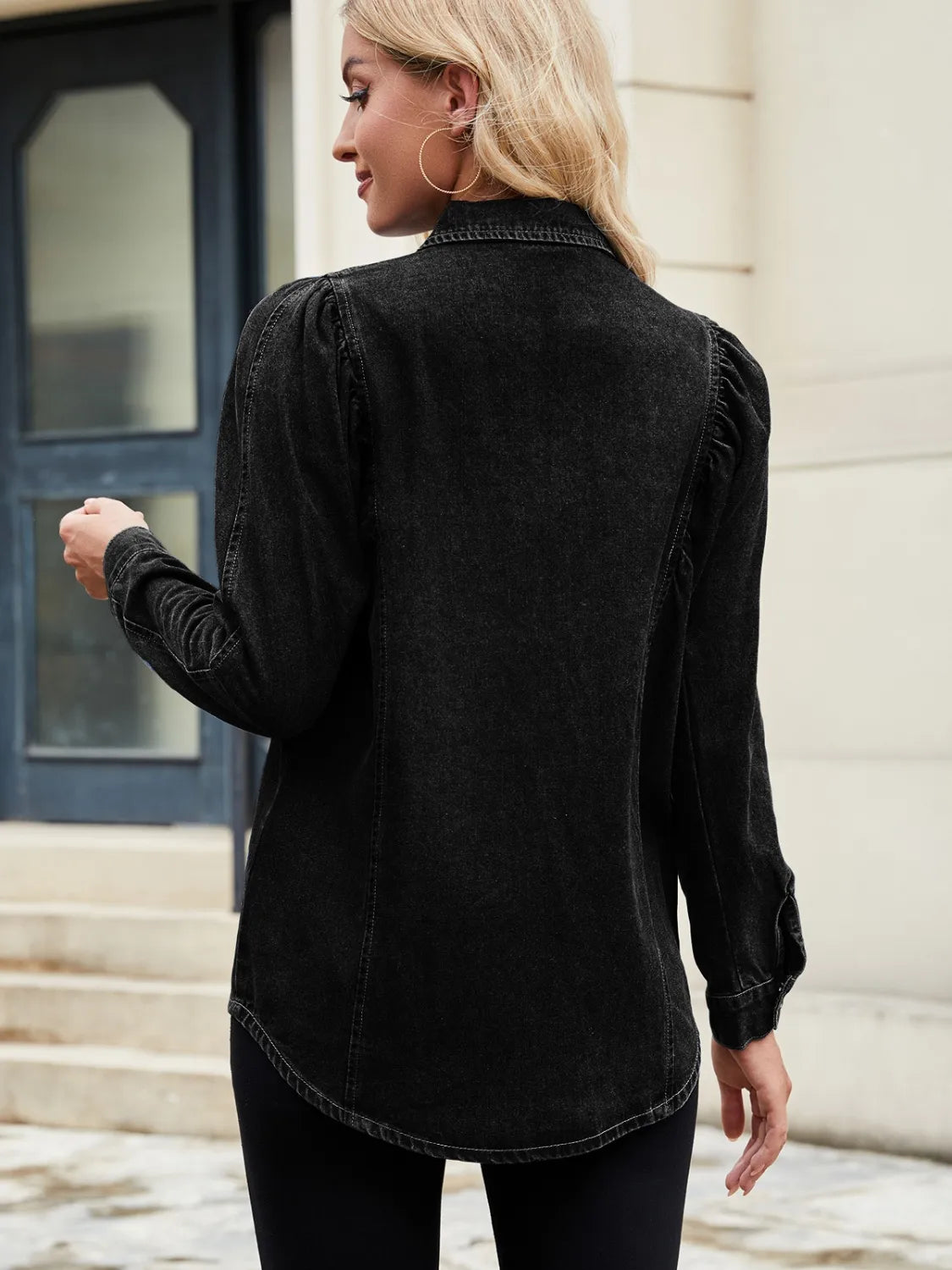 Black denim blouse with ruffled puff sleeves and button cuffs