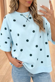 Light blue polka dot oversized t-shirt with cross-stitch detail and crew neck