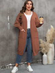 Brown oversized knit duster cardigan with patch pockets and open front.