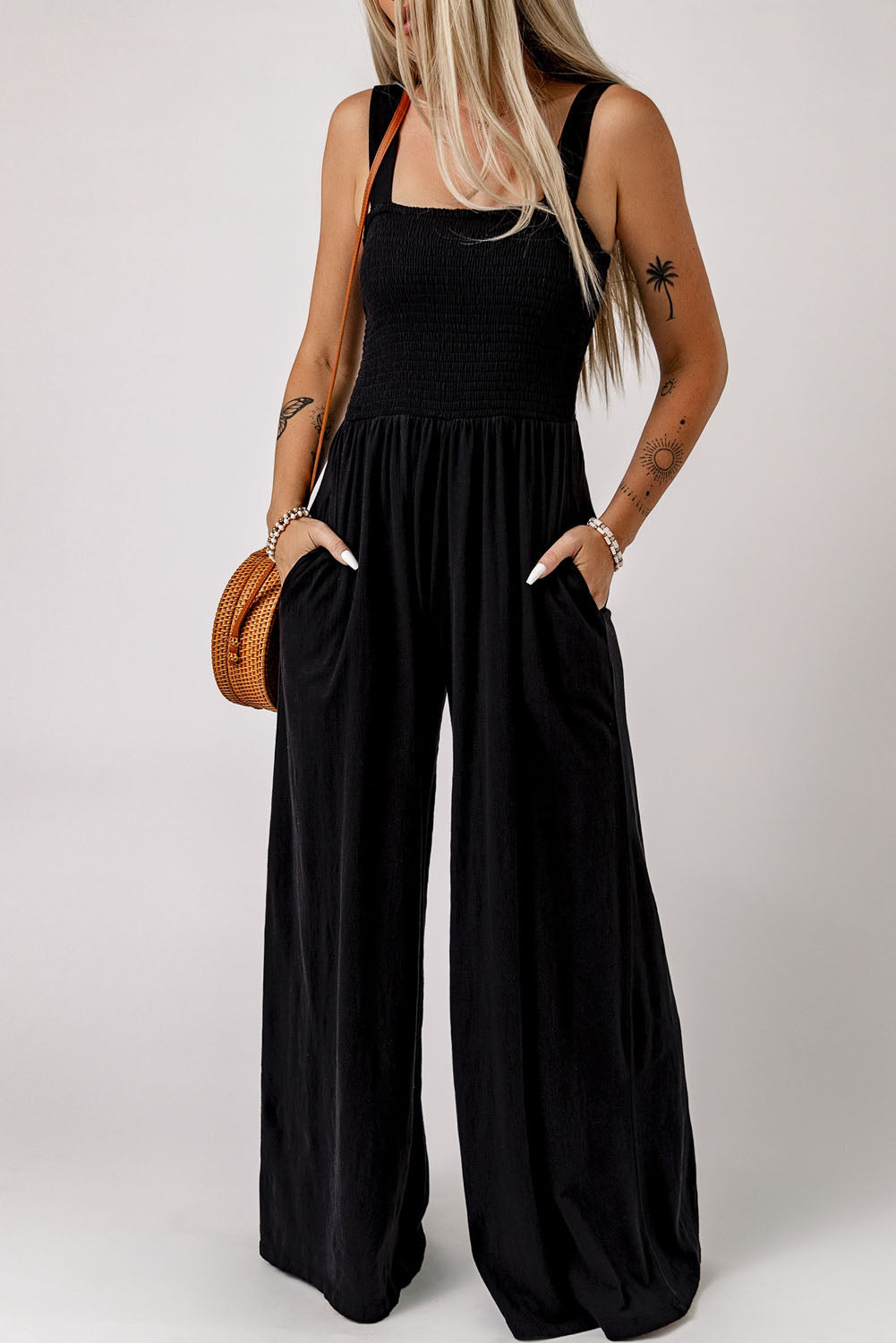 Black smocked square neck wide leg jumpsuit with pockets