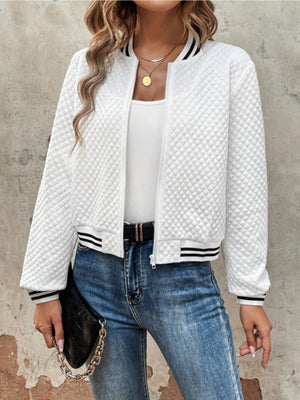 White quilted bomber jacket with striped ribbing at collar, cuffs, and hem