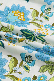 Floral V-neck mini dress in cotton with blue, yellow, and green floral print and ruffled sleeves.