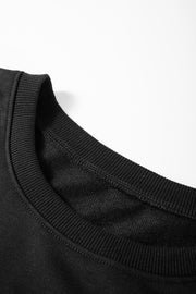 Black blouse with contrast stitching and ribbed crew neck detail
